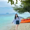 Penampilan Ayu Ting Ting ke Pantai