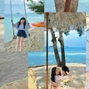 Penampilan Ayu Ting Ting ke Pantai