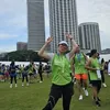 Kadek Devi pose usai finish marathon