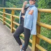 Ussy Sulistiawaty Jadi Kernet Angkot