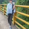 Ussy Sulistiawaty Jadi Kernet Angkot