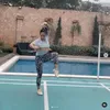 Kris Dayanti latihan wushi di lapangan tenis
