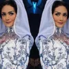 Krisdayanti Pakai Baju Muslim