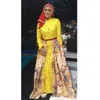Krisdayanti Pakai Baju Muslim