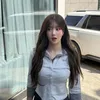 Kwon Eunbi tampil dengan gaya rambut panjang