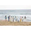 Grup K-Pop Pemotretan di Tepi Pantai