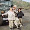 Potret Ririe Fairus momong anak.