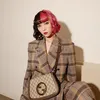 OOTD Isyana Sarasvati serba Gucci