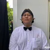 Mamuk Rahmadona pakai blangkon