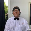 Mamuk Rahmadona pakai dasi kupu-kupu