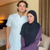 Marcell Darwin dan istri umrah 