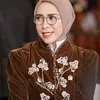 Melly Goeslaw minta maaf