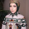 Melly Goeslaw minta maaf