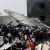 foto pesawat hercules yang jatuh di Medan