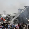 foto pesawat hercules yang jatuh di Medan