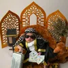 Anak Nia Photoshoot ala pak haji berkacamata