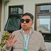 Muhammad Zidan pakai kacamata