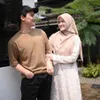 Potret Alvin Faiz dan istrinya.
