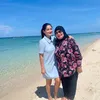 Titi Kamal Liburan di Banyuwangi