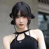 Annalisa Qiqi pakai baju hitam