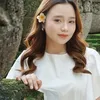 Aulia DA foto cantik pakai bunga di telinga