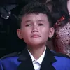 Bintang DA 8 pakai jas biru