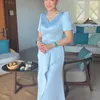 Maia Estianty Pakai Gaun Biru Muda