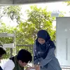  Aishah Prastowo Saat Sedang Mengajar