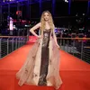 Amanda Seyfried dalam gaun bernuansa copper metalic di Red Carpet di Berlinale 2026