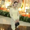 Ayu Ting Ting pakai kebaya kuning
