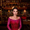 Cinta Laura Tampil Cantik Pakai Kebaya Merah