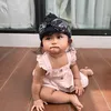 Dek Cunda Pakai Peci Blangkon