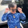 Gala Sky pakai kacamata hitam saat Cosplay Jadi PNS