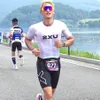 Potret Minho SHINee Finish di Ajang Triathlon