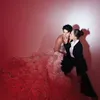 Maxime Bouttier Kenakan Gaun Pengantin Putih