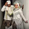 Melly Anggraini dan Suami