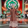 Selfi Yamma tampil percaya diri.