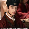 Potret Pesona Zhang Kangle Pakai Jas