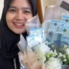 Puput Adik Teuku Ryan Lulus S2