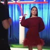 Raisa pakai dress merah