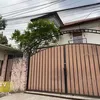 Pagar rumah Rina Nose