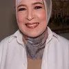 Senyuman Ibu Raisa