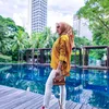 syahrini pindah ke singapura