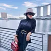syahrini pindah ke singapura