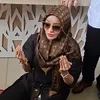 Doktif duduk bersimpuh