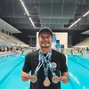 Randy Pangalila Pamer Medali