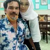 Rina Gunawan dan Teddy Syach