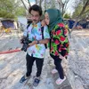 Rina Gunawan dan Keluarga
