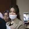 Dokter Kamelia  pakai masker