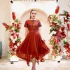 Sandra Dewi pakai dress merah